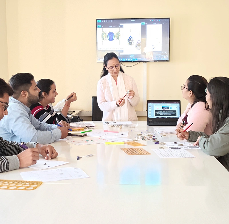 Expert Jewelry Designers at DWG Jewellery Presenting Custom Jewelry Designs and Manufacturing Concepts to the Production Team