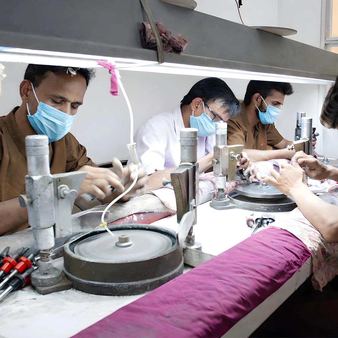 Skilled artisans polishing fine jewelry