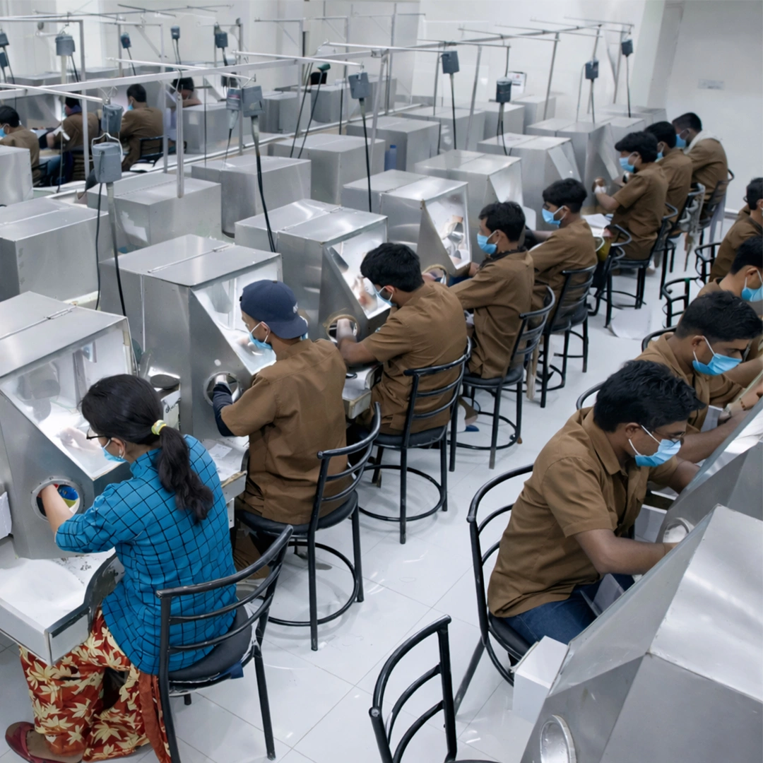 Skilled artisans in jewelry manufacturing facility