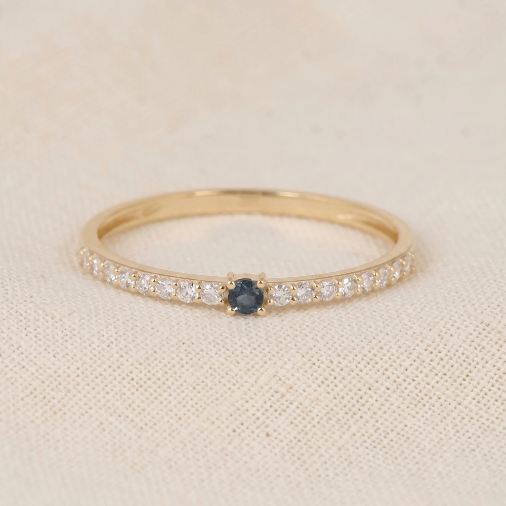 10Kt Yellow Gold Band with London Blue Topaz and Lab Diamond 10Kt Yellow Gold Band with London Blue Topaz and Lab Diamond