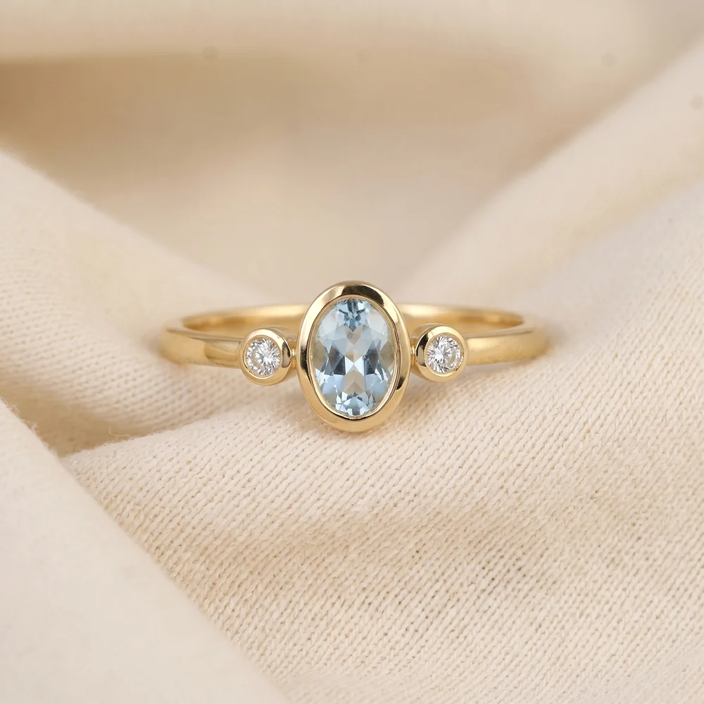 Aquamarine 9Kt Yellow Gold Ring with Lab Grown Diamond Aquamarine 9Kt Yellow Gold Ring with Lab Grown Diamond
