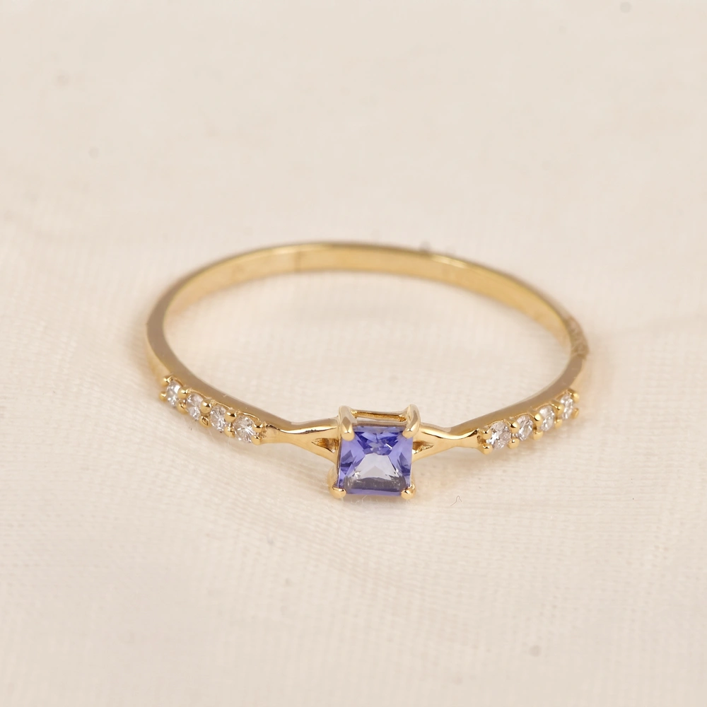Tanzanite 9Kt Yellow Gold Ring with Lab Grown Diamond Tanzanite 9Kt Yellow Gold Ring with Lab Grown Diamond