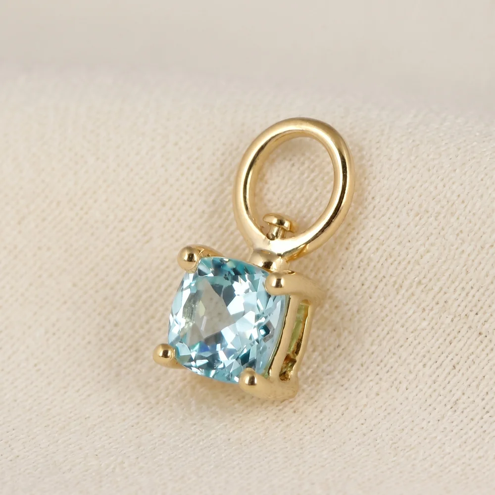 9KT Yellow Gold Cushion Lab Grown YAG Paraiba Blue Charm 9KT Yellow Gold Cushion Lab Grown YAG Paraiba Blue Charm