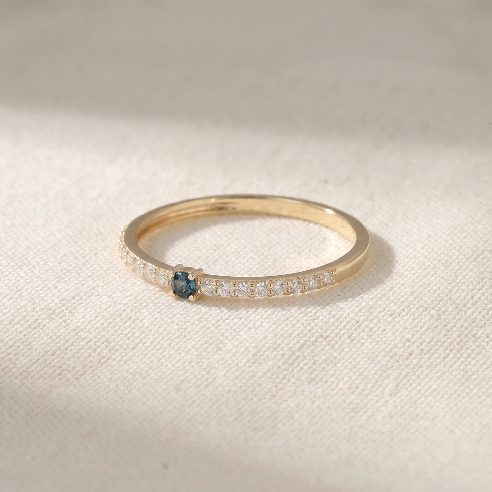 10Kt Yellow Gold Band With London Blue Topaz And Lab Diamond 10Kt Yellow Gold Band With London Blue Topaz And Lab Diamond