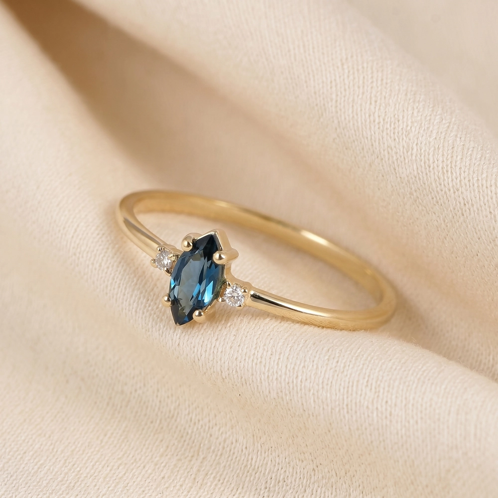 9Kt Yellow Gold Ring With London Blue Topaz And Diamond 9Kt Yellow Gold Ring With London Blue Topaz And Diamond