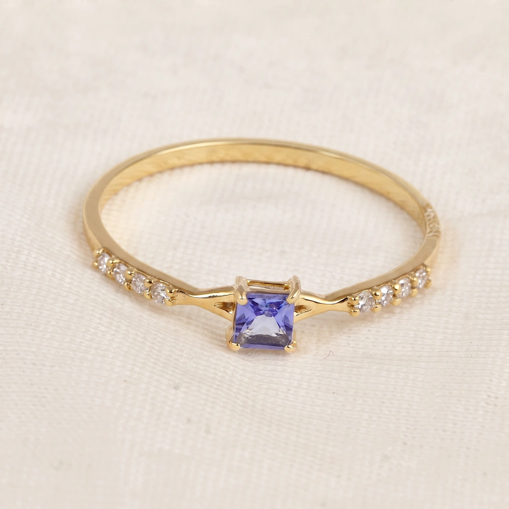 Tanzanite 9Kt Yellow Gold Ring With Lab Grown Diamond Tanzanite 9Kt Yellow Gold Ring With Lab Grown Diamond