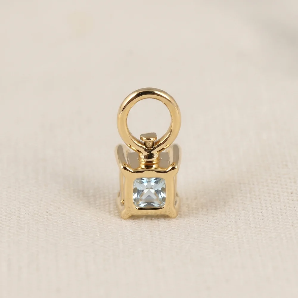 9KT Yellow Gold Cushion Lab Grown YAG Paraiba Blue Charm 9KT Yellow Gold Cushion Lab Grown YAG Paraiba Blue Charm