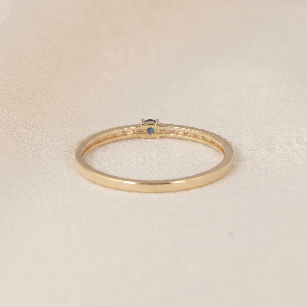 10Kt Yellow Gold Band With London Blue Topaz And Lab Diamond 10Kt Yellow Gold Band With London Blue Topaz And Lab Diamond