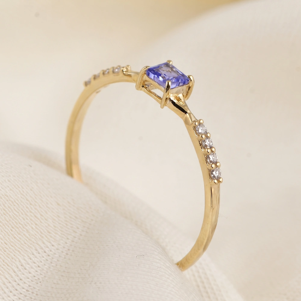 Tanzanite 9Kt Yellow Gold Ring With Lab Grown Diamond Tanzanite 9Kt Yellow Gold Ring With Lab Grown Diamond