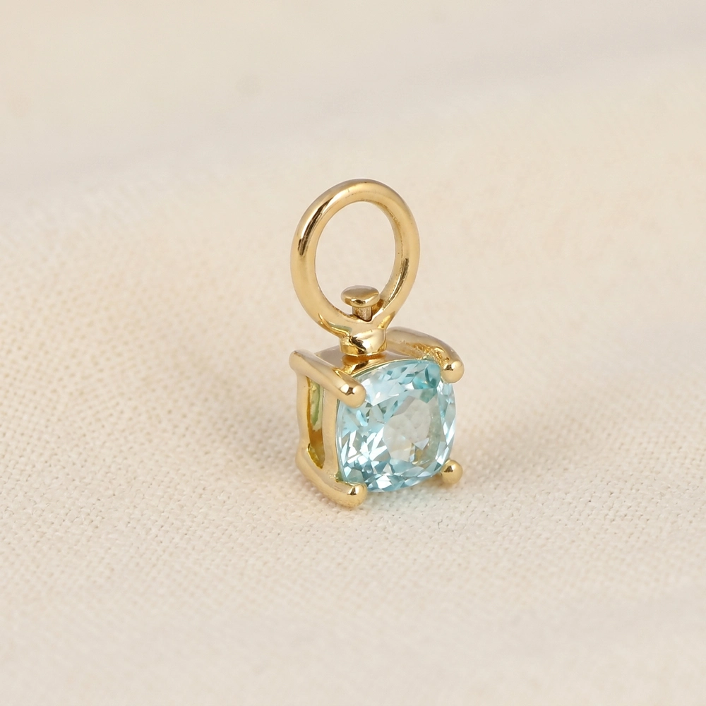 9KT Yellow Gold Cushion Lab Grown YAG Paraiba Blue Charm 9KT Yellow Gold Cushion Lab Grown YAG Paraiba Blue Charm