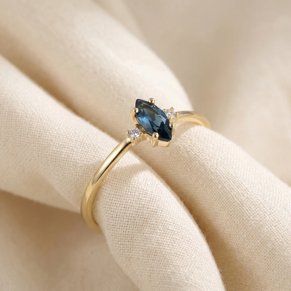 9Kt Yellow Gold Ring With London Blue Topaz And Diamond 9Kt Yellow Gold Ring With London Blue Topaz And Diamond