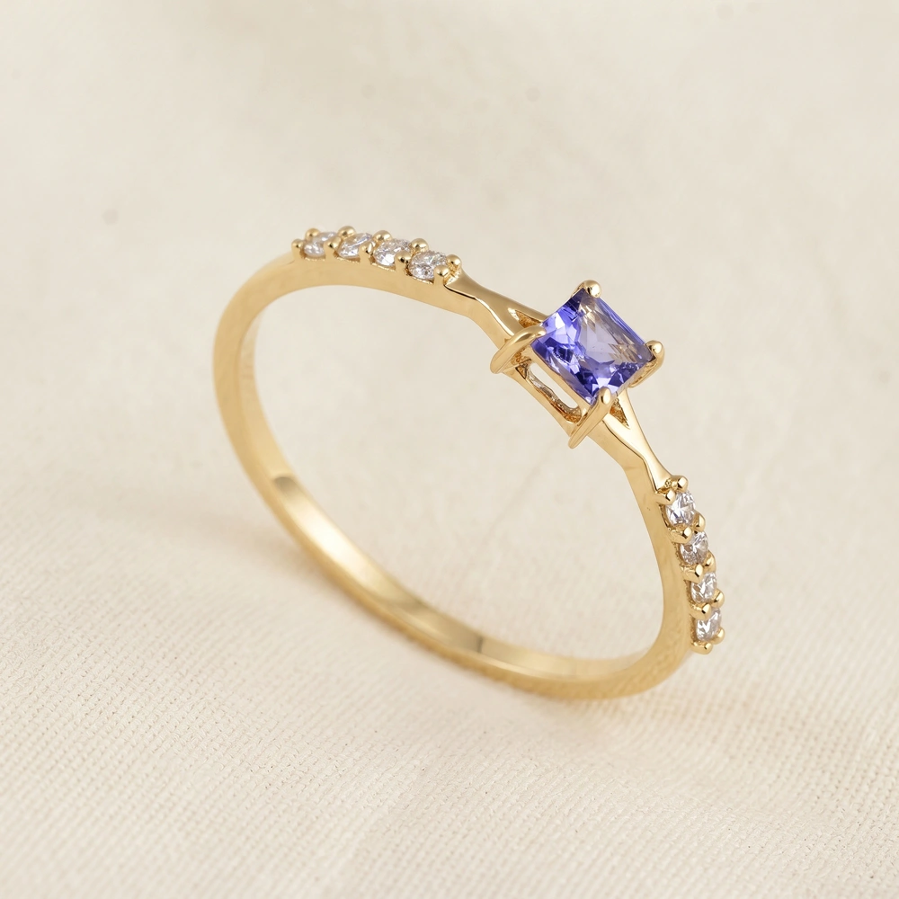Tanzanite 9Kt Yellow Gold Ring With Lab Grown Diamond Tanzanite 9Kt Yellow Gold Ring With Lab Grown Diamond