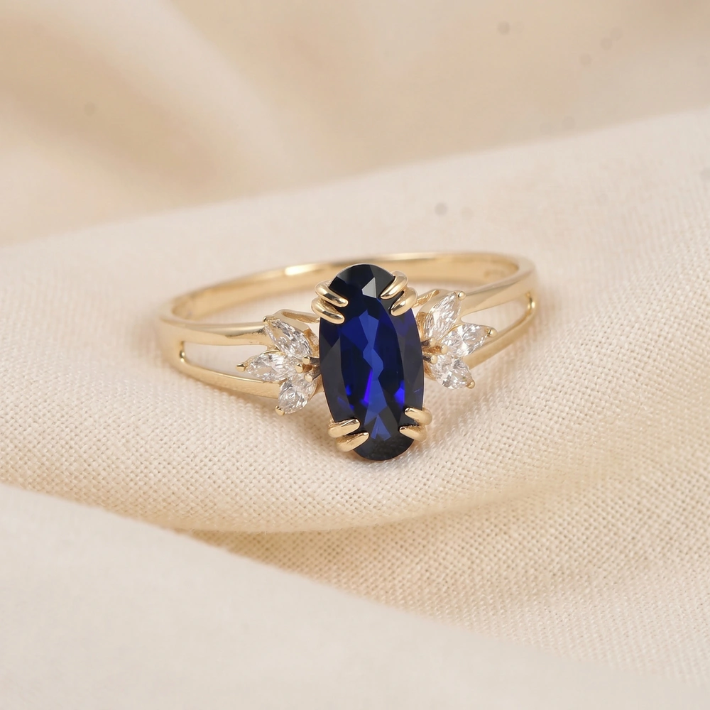 9Kt Yellow Gold Ring Lab Diamond And Royal Blue Sapphire 9Kt Yellow Gold Ring Lab Diamond And Royal Blue Sapphire