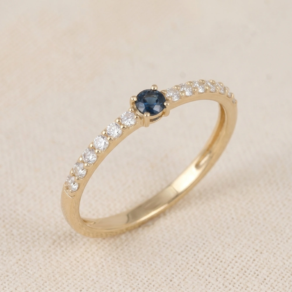 10Kt Yellow Gold Band With London Blue Topaz And Lab Diamond 10Kt Yellow Gold Band With London Blue Topaz And Lab Diamond