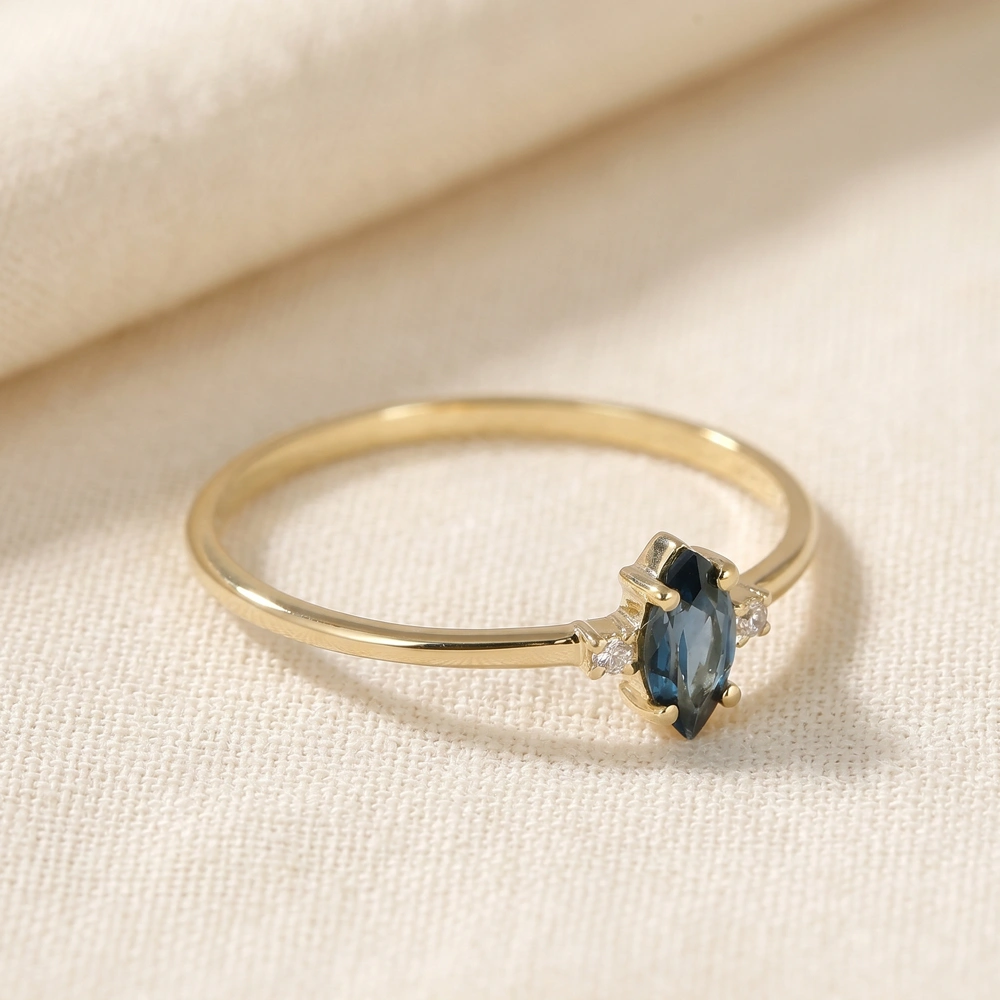 9Kt Yellow Gold Ring With London Blue Topaz And Diamond 9Kt Yellow Gold Ring With London Blue Topaz And Diamond