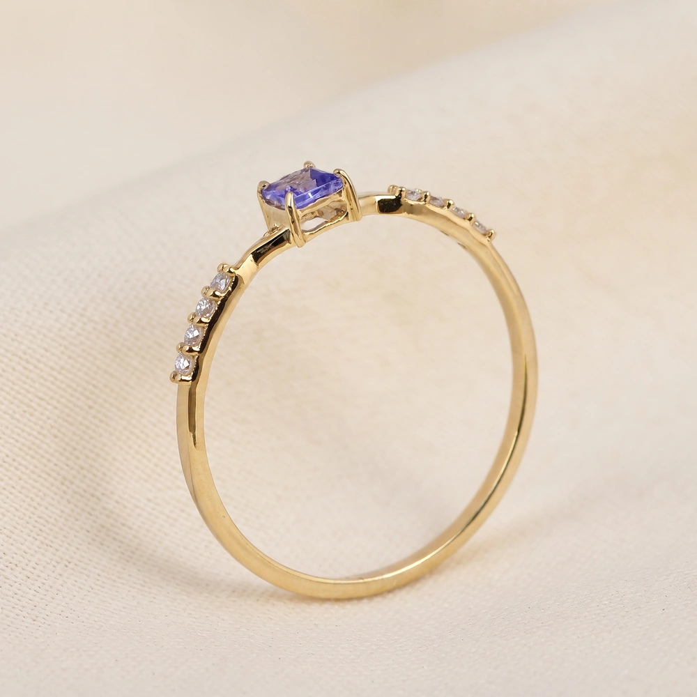Tanzanite 9Kt Yellow Gold Ring With Lab Grown Diamond Tanzanite 9Kt Yellow Gold Ring With Lab Grown Diamond