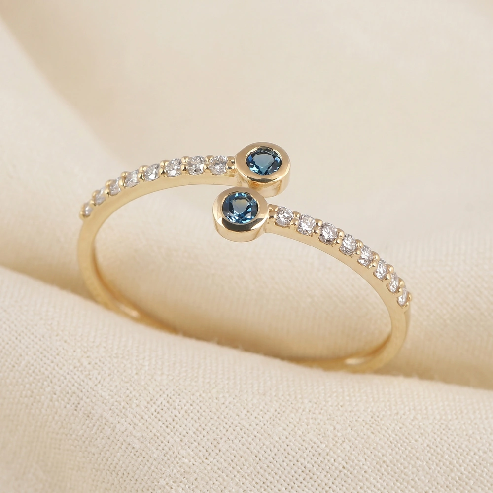 London Blue Topaz 9Kt Yellow Gold Ring With Lab Grown Diamond London Blue Topaz 9Kt Yellow Gold Ring With Lab Grown Diamond